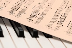 Music sheet on piano keys